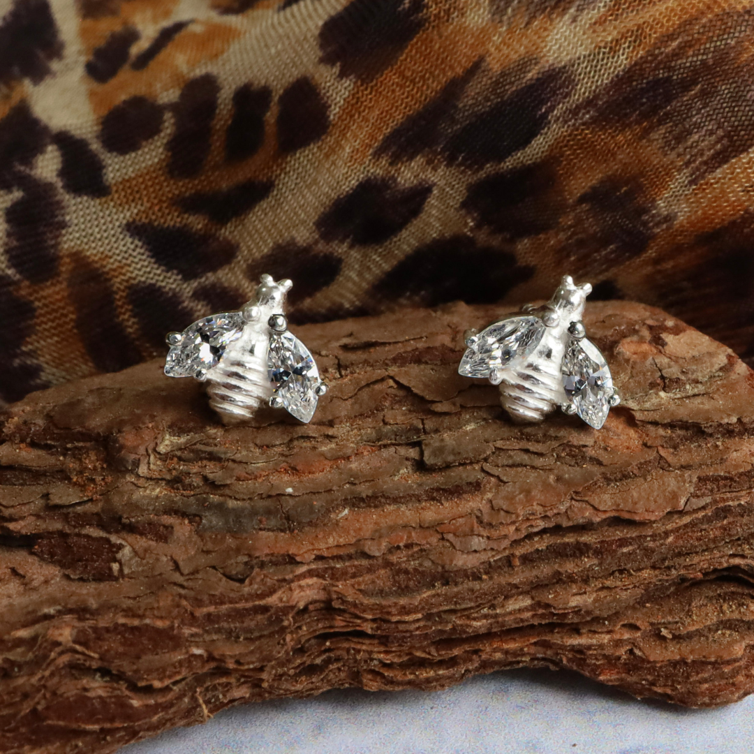 Sterling Silver Bee Earrings with CZ Wings - Whimsical Elegance for the Nature Lover. These exquisite earrings feature a delicate bee design with sparkling CZ wings, perfect for adding a touch of elegance to any outfit