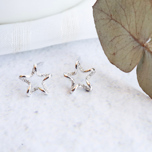 Sterling Silver Star with CZ's Earring - Beautifully crafted star design with sparkling CZ's, adding a touch of twinkling elegance to any outfit