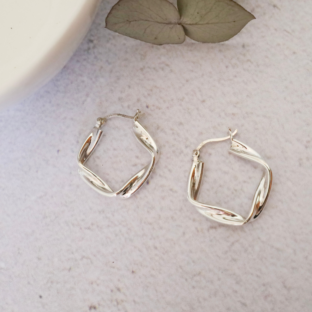 Sterling Silver Twisted Square Hoop Earrings - Unique twisted square hoop design expertly crafted from premium quality sterling silver, adding a touch of modern elegance to any outfit