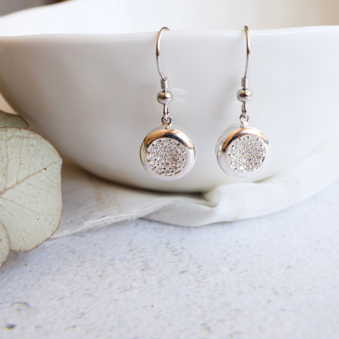 Sterling Silver and Cubic Zirconia Earrings - Sparkling cubic zirconia expertly crafted from premium sterling silver, adding a touch of elegance and sophistication to any outfit.