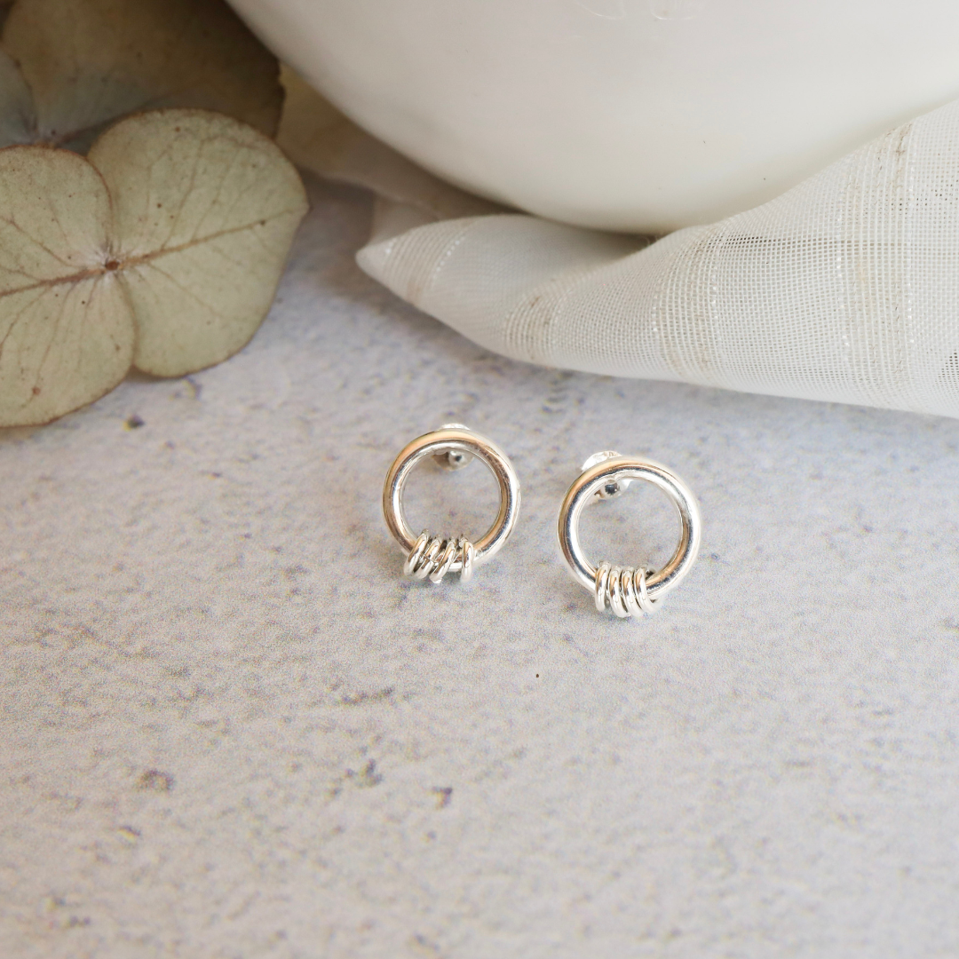 Sterling Silver Circle Stud Earrings - Delicate small circles expertly crafted from premium quality sterling silver, adding a touch of elegant sophistication to any outfit