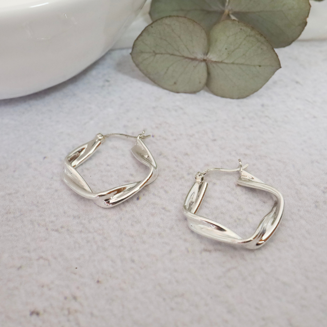 Sterling Silver Twisted Square Hoop Earrings - Unique twisted square hoop design expertly crafted from premium quality sterling silver, adding a touch of modern elegance to any outfit